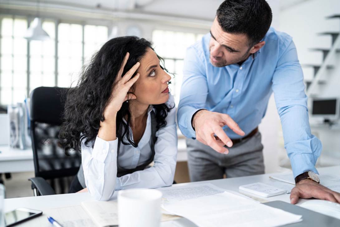 A person and person looking at a computer
AI-generated content may be incorrect.